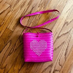 Hot pink weaved crossbody/shoulder bag with white heart decor, never used